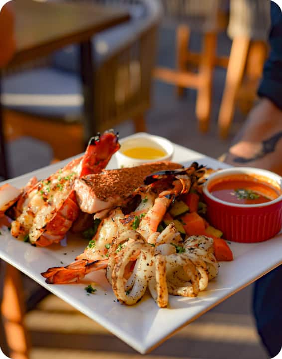 Freshly prepared seafood served at a Bite Club Cayman Islands restaurant
